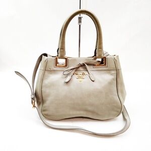 PRADA - Vitello Bow R1.277
